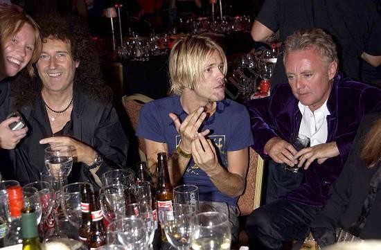 brian and roger with taylor hawkins