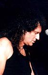 Brian in black, on stage