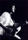 Brian playing his guitar on The Magic Tour