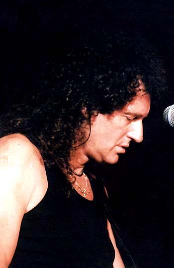 Brian in black, on stage