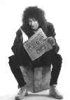 brian reading a newspaper