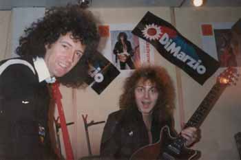 Brian with Yngwie Malmsteen who's holding the Red Special