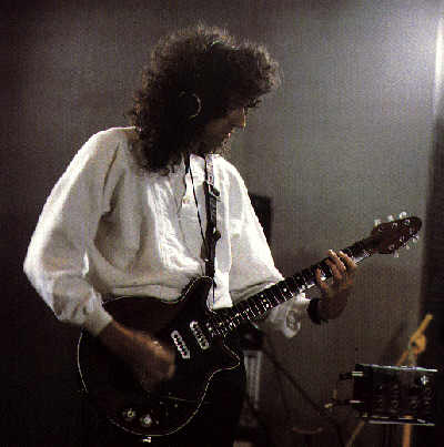Brian in the studio during recording of 'One Vision'