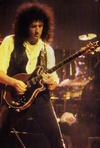 Brian playing his guitar.