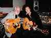 Brian May with a person i dont know....