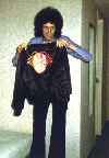 Brian holding up a jacket xD