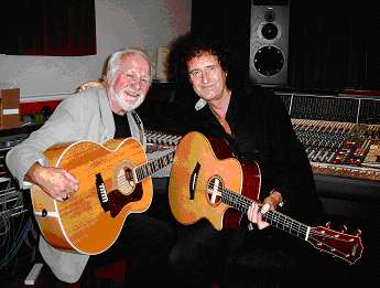 Brian May with a person i dont know....