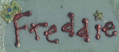 Freddie's name.. with a crown..