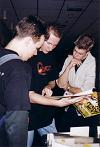 Back Chat, Fried Chicken and me (Plengel) looking very interested in the "Gluttons For Punishment" Tourbook