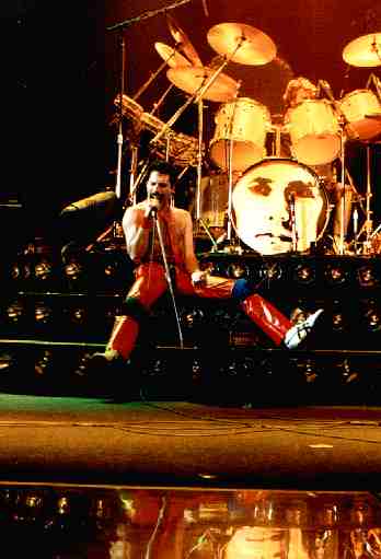 front of the drums