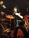 Freddie in front of drums 1974