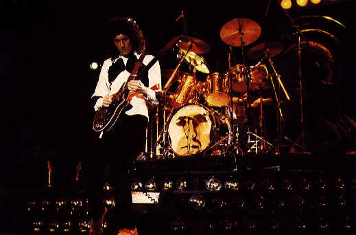 Brian on stage in front of the drums in the early 80's