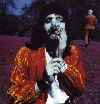 Freddie.... smelling the flower?.. LoL