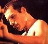 Freddie looking down at the piano