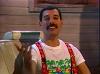 Freddie in a strange outfit doing an interview