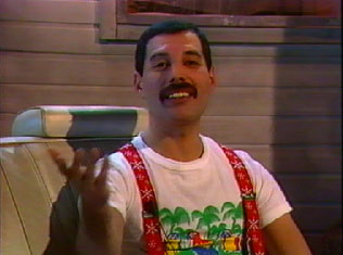 Freddie in a strange outfit doing an interview