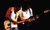 Brian shows Freddie how to play...