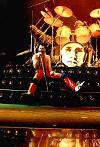 front of the drums