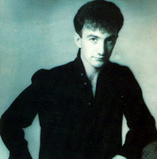 John in blue black and white