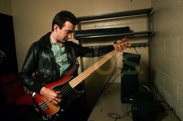 Deaky tuning his bass
