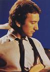 John playing the bass