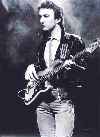 amongst the smoke emerges...John Deacon!! Ahh!