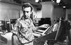 John playing a Synth