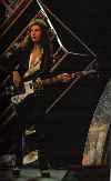 John playing his guitar