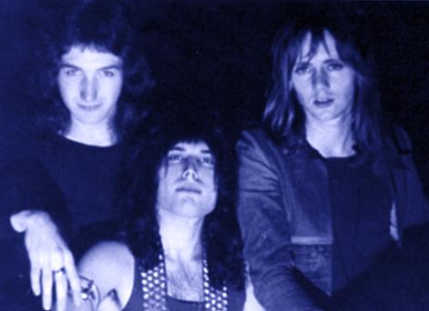 Freddie,Roger and John in blue
