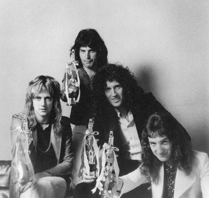OMG! the all got diffrent faces; roger is sexy,Freddie is rocken,Brian is sweet and,john is cute! lol