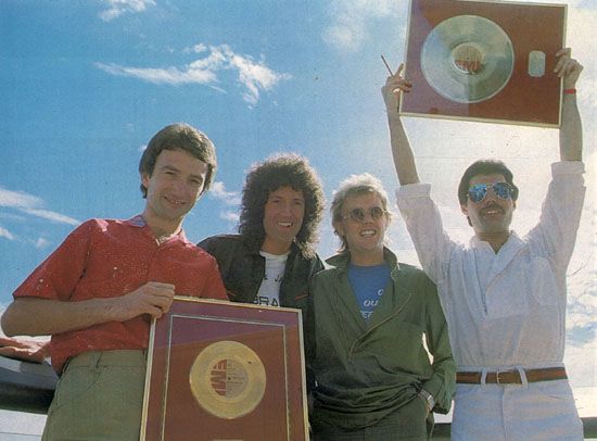Queen holding gold disks
