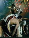Roger and Freddie having fun, live