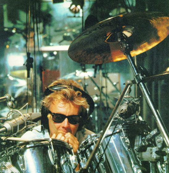 With Drums in 'One Vision' Video