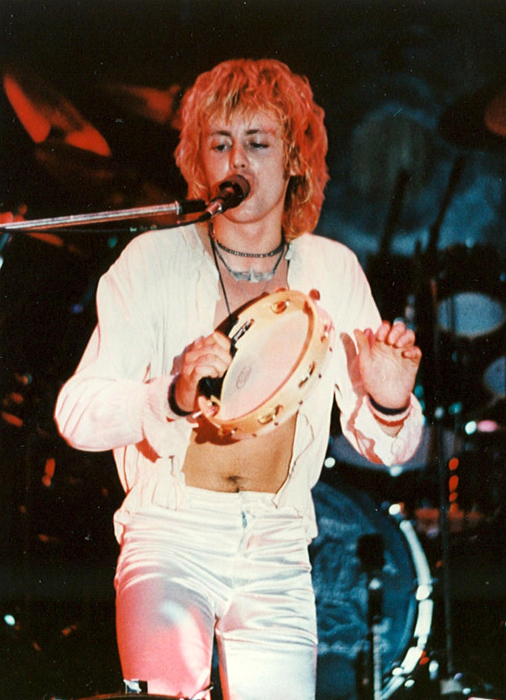 Roger on tambourine...bit of chest showing!