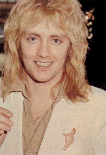what a beautiful smile...and look at his blond hair and blue eyes !