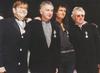 Brian, Roger and John with Sir Elton John